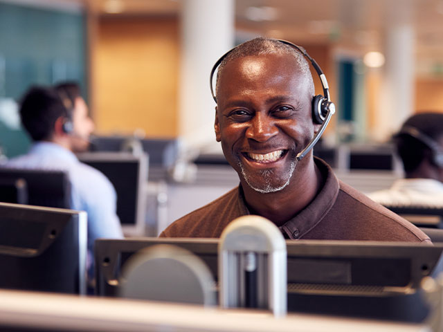Call center worker smiling